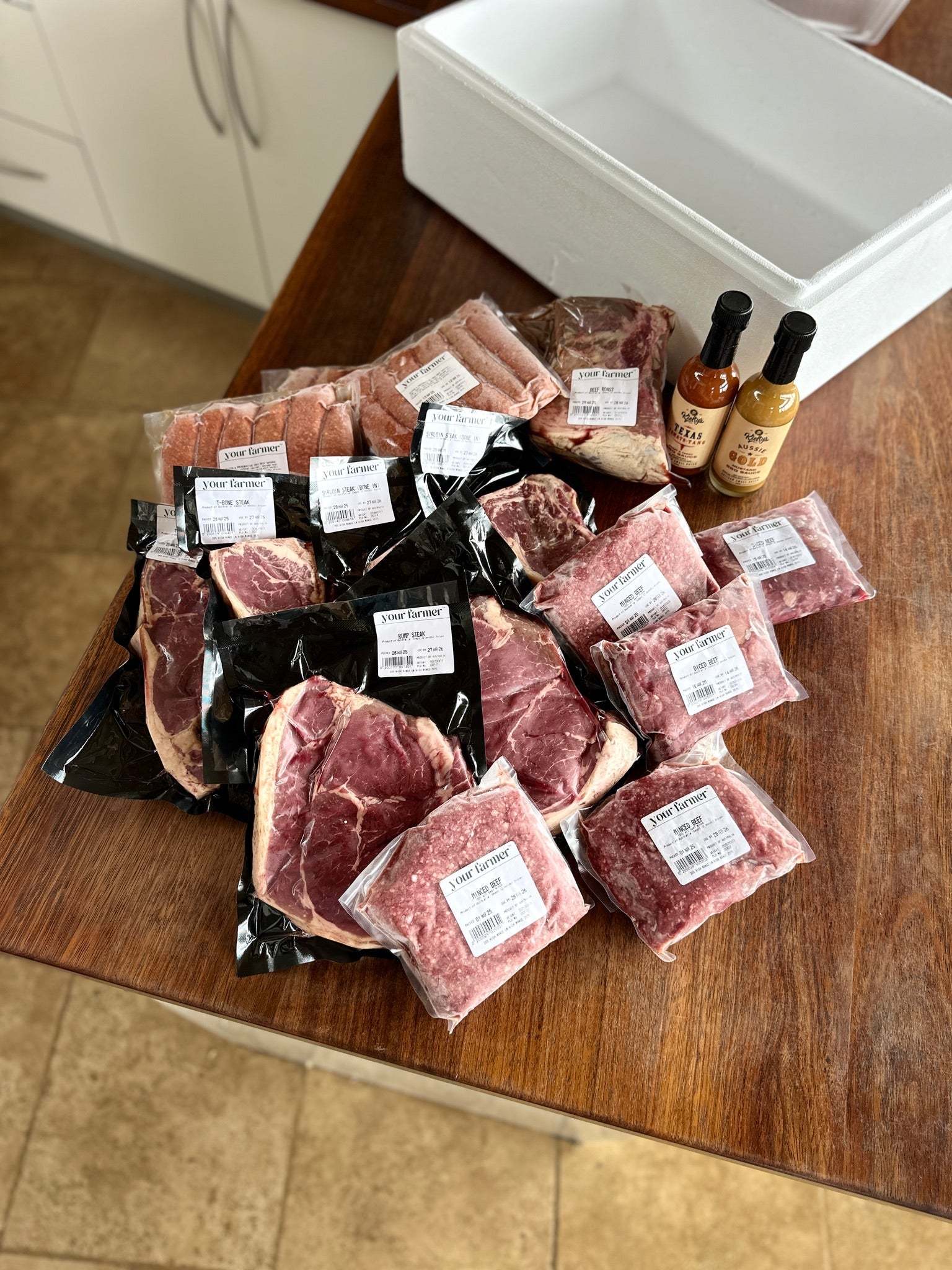 CSA Grass Fed Beef Share premium vacuum-sealed cuts including steaks, roasts, mince, and sausages delivered fresh