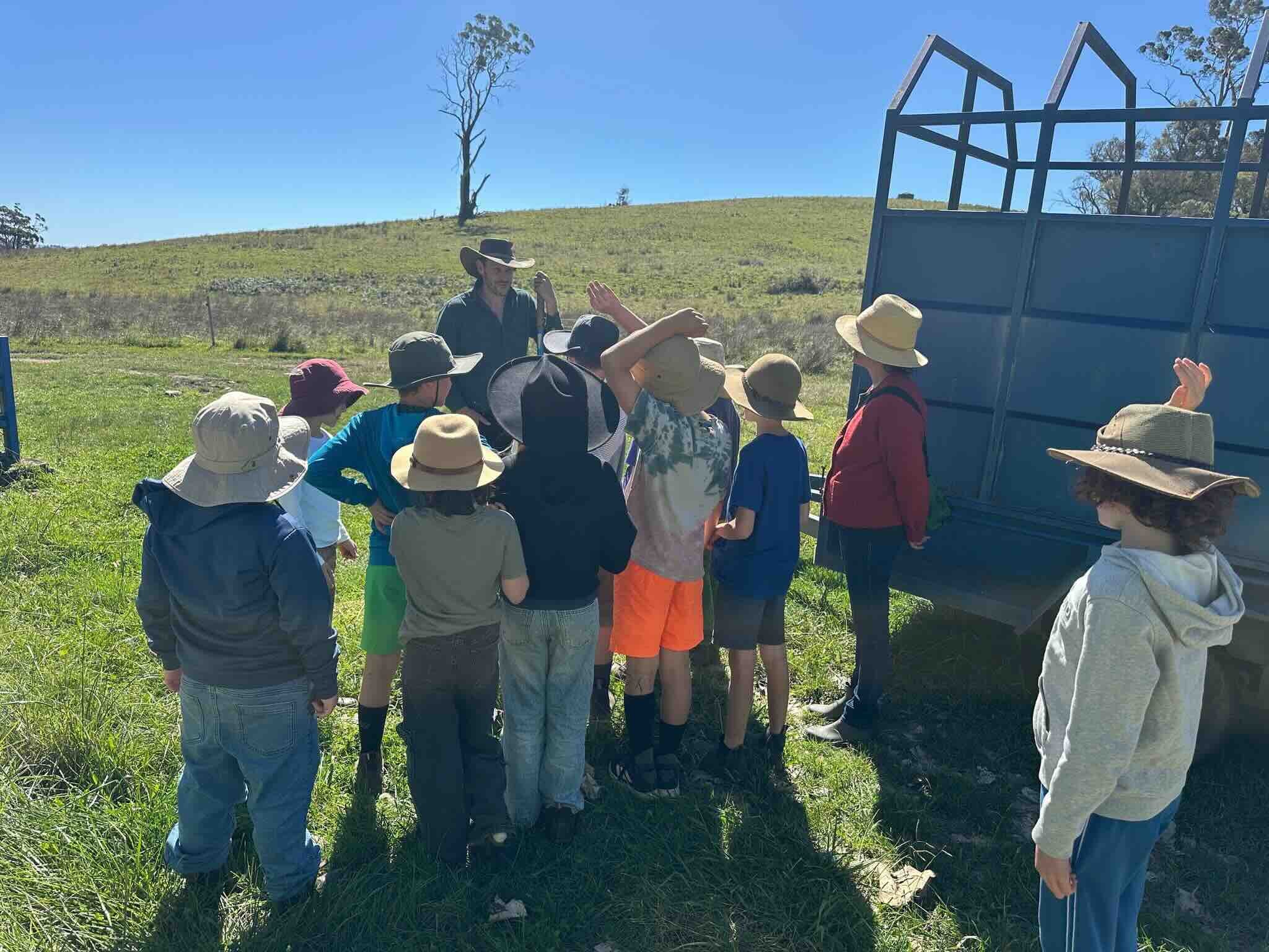 David Savill, founder of Your Farmer, with school kids on the farm — teaching the next generation about ecological agriculture